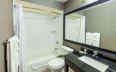 Private guest bathroom with tub at Comfort Inn Corner Brook.