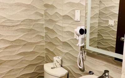 Guest bathroom at Rodeway Inn Cranston JFK.