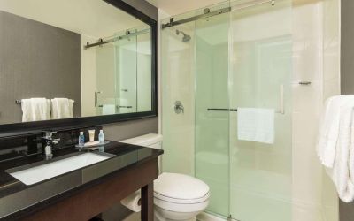 Guest bathroom with shower and free toiletries at Comfort Inn Dryden.