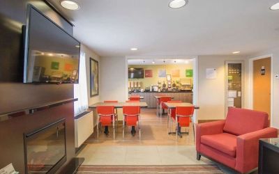 Lobby lounge with fireplace at Comfort Inn Amherst.