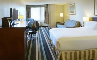 Bright day use room with living area and workspace at Holiday Inn Conference Center Edmonton South.