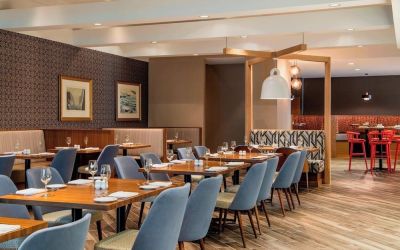 Dining area with comfortable seating at Delta St. John's Hotel & Conference Center.