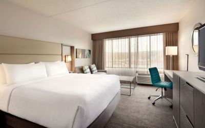 Day use room with work desk and sofa at Crowne Plaza Englewood.