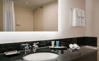 Guest bathroom with shower at Crowne Plaza Englewood.