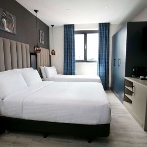 Day use room with TV at Spark By Hilton Luton.