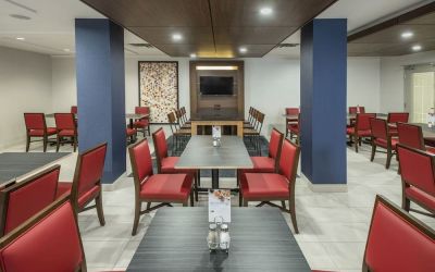 Dining area with comfortable seating at Holiday Inn Express & Suites Medicine Hat.