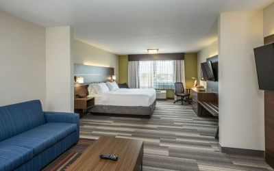 Day use suite with work desk and living area at Holiday Inn Express & Suites Medicine Hat.