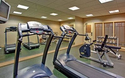Well equipped fitness center at Holiday Inn Express & Suites Medicine Hat.