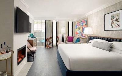 Day use room with balcony and sofa at Le Parc At Melrose.