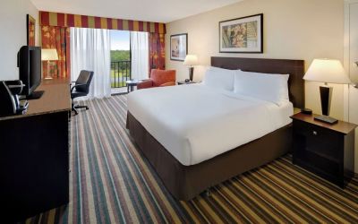 Day use room with balcony and work desk at Holiday Inn Orlando SW - Celebration Area.