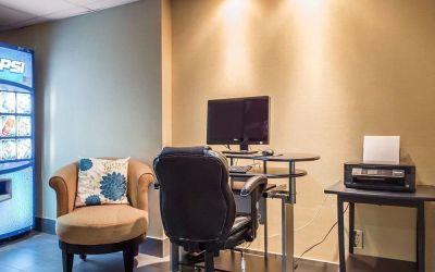 Business center with computer, printer and ergonomic chair at Comfort Inn Pembroke.