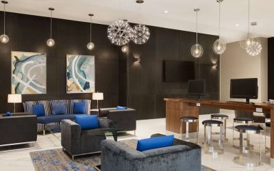 Business center and lounge area at Embassy Suites By Hilton Toronto Airport.