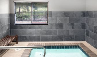 Indoor spa tub at Garner By IHG.