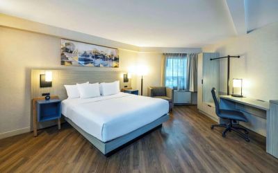 Bright and spacious day use room with work desk, sofa and private bathroom at Comfort Inn Moncton Magnetic Hill.