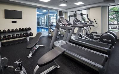 Fully equipped fitness center at Holiday Inn & Suites Oakville At Bronte.