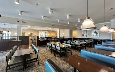 Dining area with comfortable seating at Holiday Inn Toronto Airport East.