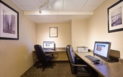 Business center with computers, printer and ergonomic chair at Best Western North Bay.