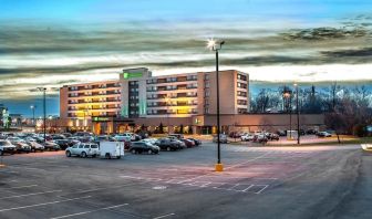 Hotel exterior and parking area at Holiday Inn Laval Montreal.