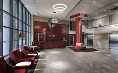 Lobby lounge with comfortable seating at Les Suites Hotel Ottawa.