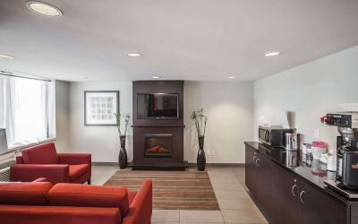 Lobby lounge with comfortable seating and fireplace at Comfort Inn Edmonton West.