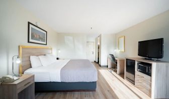 Bright and spacious day use room with TV and work desk at Halifax Airport Hotel.