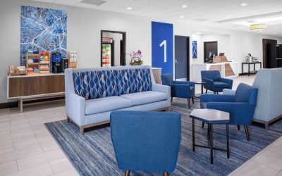 Lobby and coworking lounge at Holiday Inn Express & Suites Hermosa Beach.