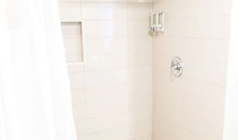 Guest bathroom with shower at Hotel Current.