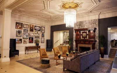 Lobby lounge with fireplace at The Royal Horseguards Hotel.
