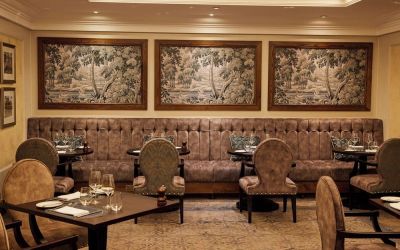 Dining area with comfortable seating at The Royal Horseguards Hotel.