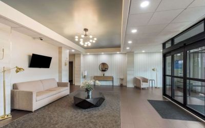 Lobby and coworking lounge at Best Western Executive Hotel Of New Haven-West Haven.