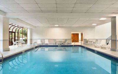 Indoor pool area at Hampton Inn New York - LaGuardia Airport.