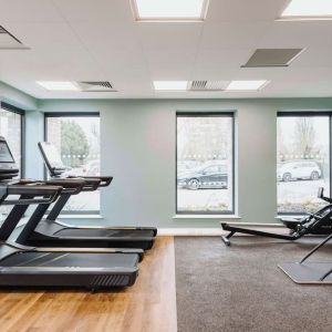 Fitness center at Graduate By Hilton Cambridge.