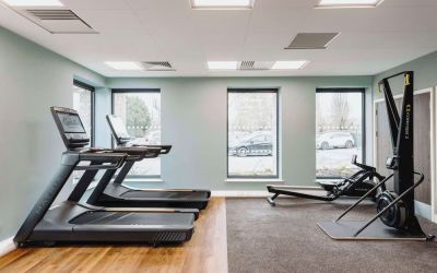 Fitness center at Graduate By Hilton Cambridge.