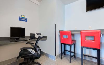 Business center with computer and printer at Hotel 1550 SFO.