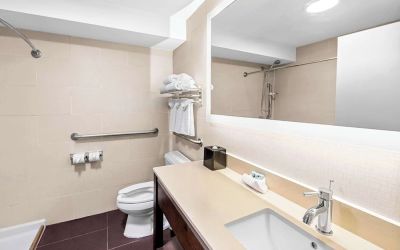 Guest bathroom with shower at Best Western Inn At Ramsey.