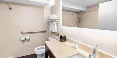 Guest bathroom with shower at Best Western Inn At Ramsey.