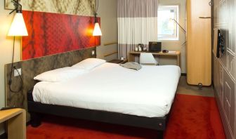 Standard day use room with king bed and work desk at ibis Leicester City.