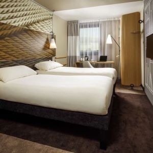 Day use room with work desk, TV screen and private bathroom at ibis Leicester City.