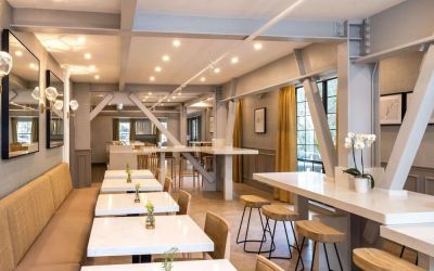 Dining area perfect for coworking at The Inn At Saratoga, Tapestry Collection By Hilton.