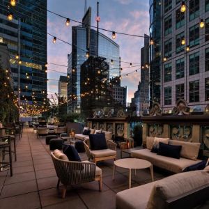 Rooftop terrace seating at The Knickerbocker Hotel.