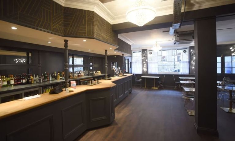 Hotel bar with sitting area at The Pack And Carriage London Hotel.