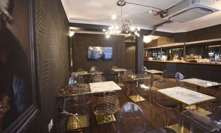 Dining area at The Pack And Carriage London Hotel.