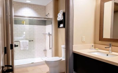 Guest bathroom with shower at Staybridge Suites Baltimore - Inner Harbor.