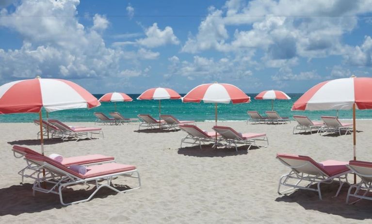 Cabanas and loungers available by the beach at SLS South Beach. 
