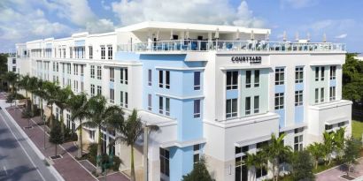 Hotel exterior at Courtyard Delray Beach.
