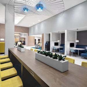 Media pods and lounge area at Courtyard Delray Beach.
