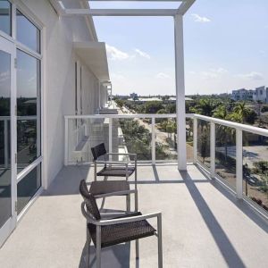 Balcony inside day use room at Courtyard Delray Beach.
