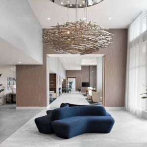 Lobby and coworking lounge at Courtyard Delray Beach.
