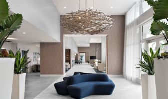 Lobby and coworking lounge at Courtyard Delray Beach.
