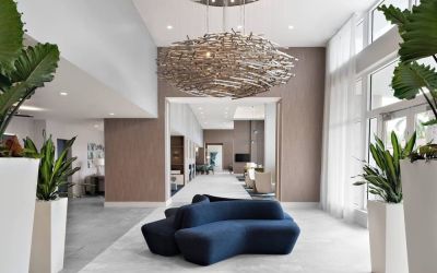 Lobby and coworking lounge at Courtyard Delray Beach.
